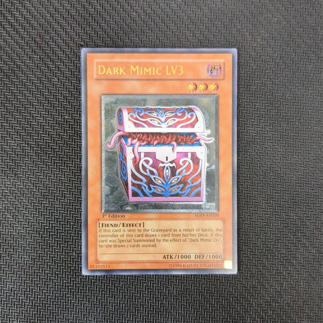 遊戯王♦️絶版旧アジア1st♦️5つ目 暗黒のミミックLV3レリーフ 遊戯王♦️絶版旧アジア1st♦️5つ目 暗黒のミミックLV3レリーフ